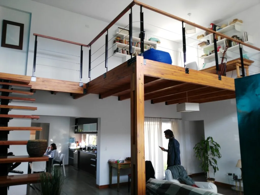 Luxury home in Roldán, Argentina, designed by architect Javier Colomino. Modern, minimalist and mostly on the ground floor, with a central double height