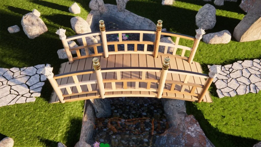 Puente tradicional japonés en madera, diseño de Javier Colomino; con terminaciones doradas y linternas de piedra en postes