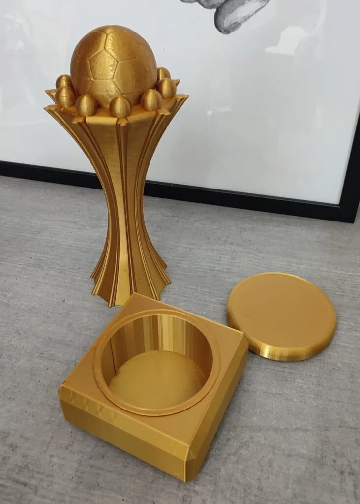 3D-printed gold trophy for the champion team of a football club in Valencia, designed by artist Javier Colomino